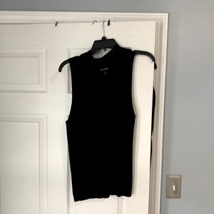 Very flattering black turtle neck with V shape cut out!